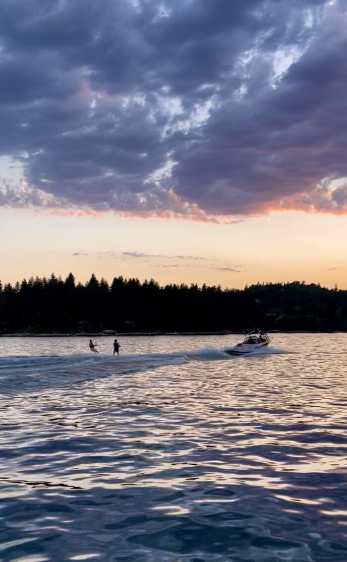 sunset on the lake, lake arrowhead, water skiing, water skiing on lake arrowhead, lake life, boats on lake arrowhead, sunset water ski, double water skiers, water skiers on a lake