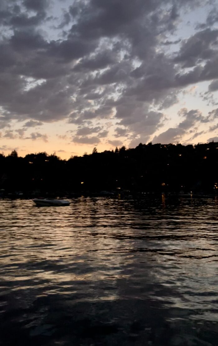 on the water at night, boats on lake arrowhead at night, light reflect on rippling water on the lake at night