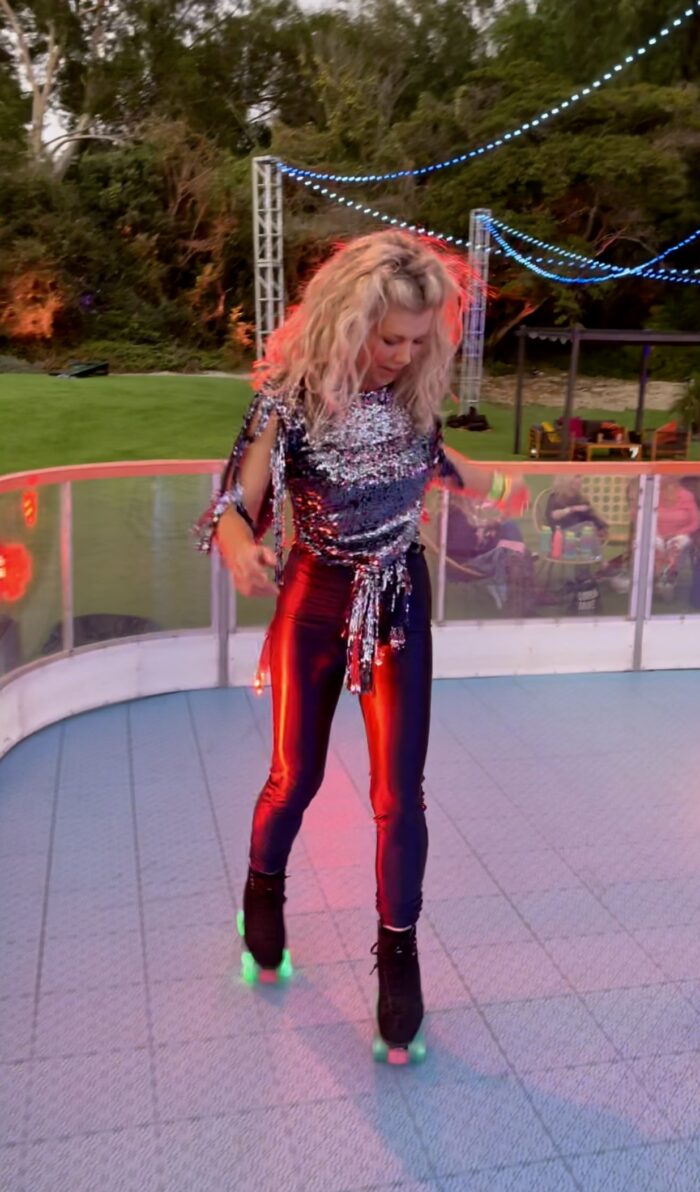 discoasis at the botanical gardens summer 2021, roller disco, roller skating, disco night, 70s roller disco, roller skates, light up wheels, disco oasis, roller skate disco outfits, disco fashion