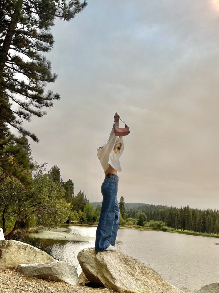 lee, lee jeans, 90s look, cropped hoodie sweatshirt, high rise a line wide leg jeans, nikes, denim, lake arrowhead, pretty sky, nature, girl standing in front of a lake