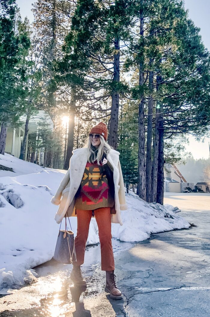 cute winter style, winter outfits in the snow, lake arrowhead, monochromatic outfit, rust and brown outfit, docs, winter outfit with dr martens, shearling coat, cropped pants, rust and brown outfit