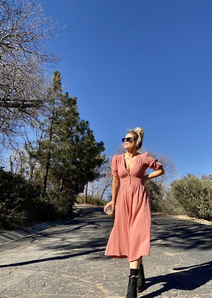 free people love of my life dress in pink, pink midi dress, pink free people dress, dress with docs, dr martens, lake arrowhead, deserted road, street style, spring style