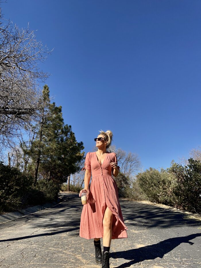 free people love of my life dress in pink, pink midi dress, pink free people dress, dress with docs, dr martens, lake arrowhead, deserted road, street style, spring style