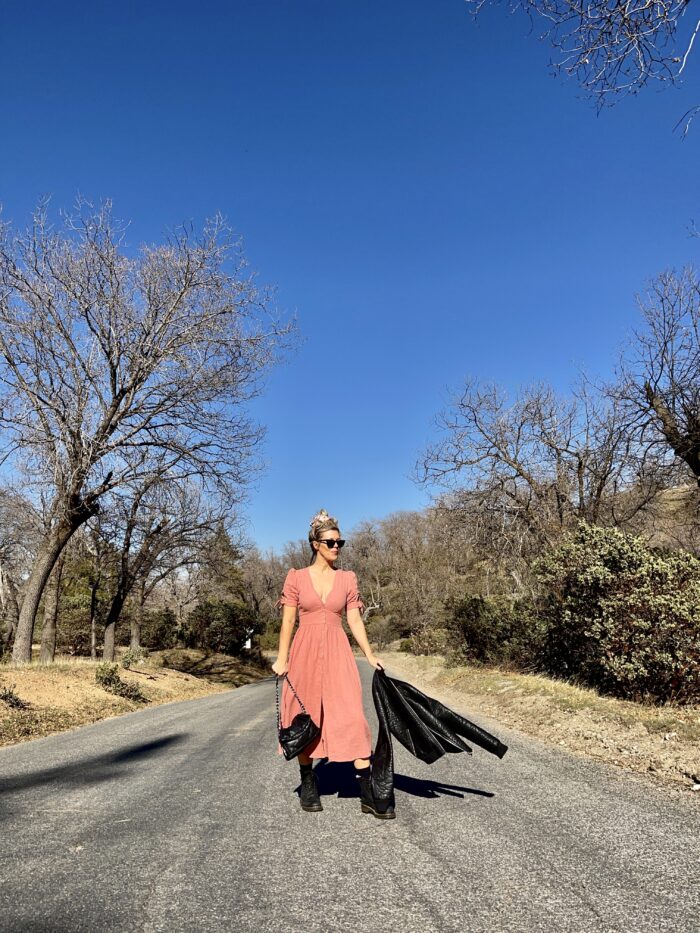 free people love of my life dress in pink, pink midi dress, pink free people dress, dress with docs, dr martens, lake arrowhead, deserted road, street style, spring style