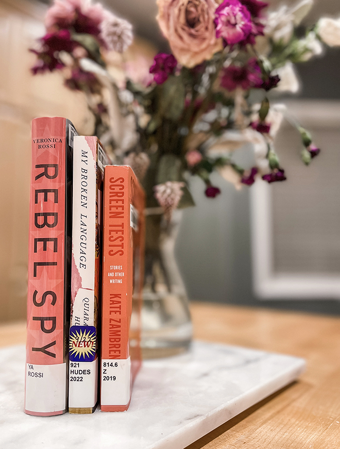 pink books and pink flowers