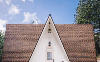 the little apple a-frame in lake arrowhead running springs white a-frame cabin with pink door for sale california