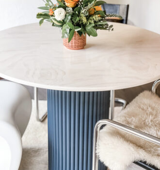 DIY round dining table with contrasting dowel rippled base