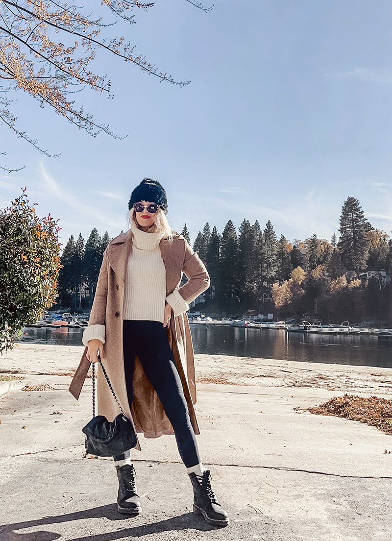 casual chic fall style in dressed up leggings look with long wool coat in neutral colors by the lake 