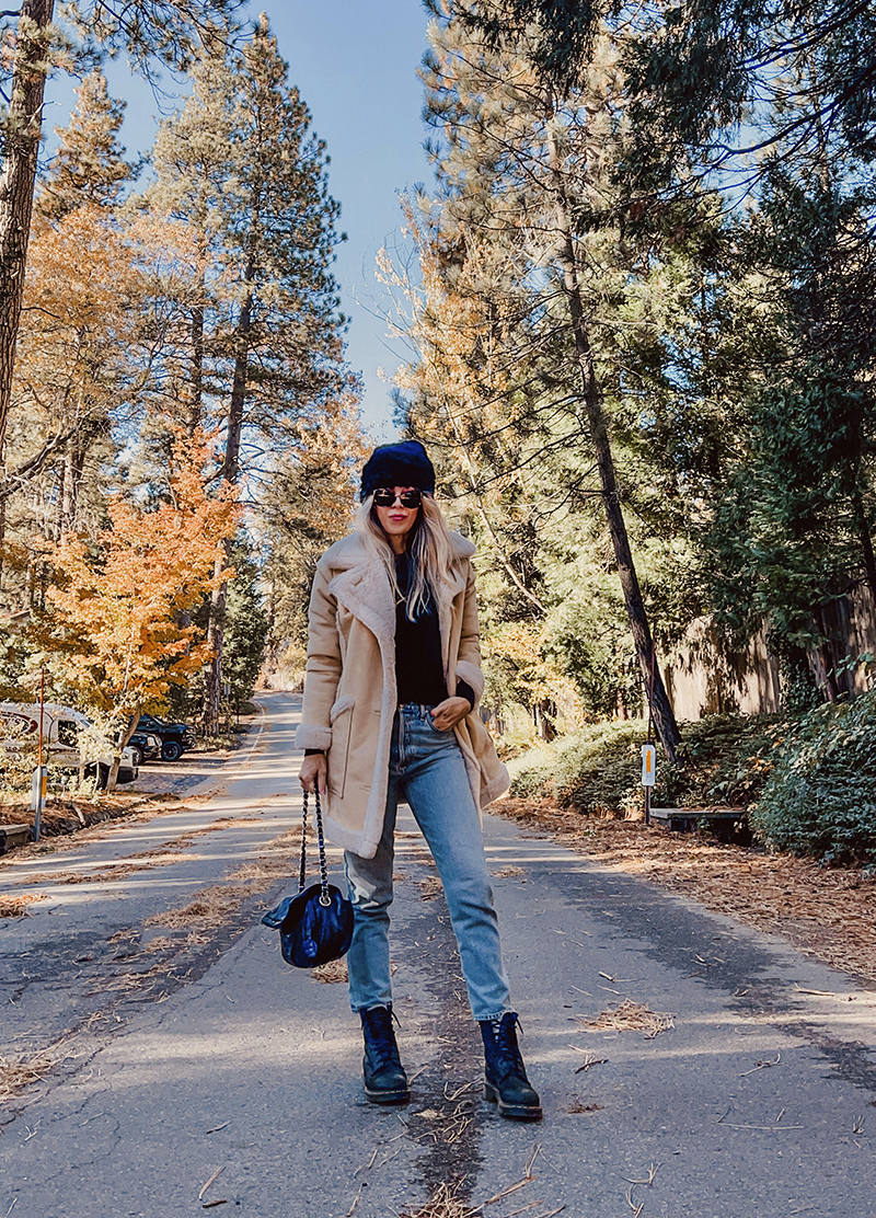 fall style, casual style with jeans, blonde on a tree lined street in the fall in lake arrowhead, love maegan