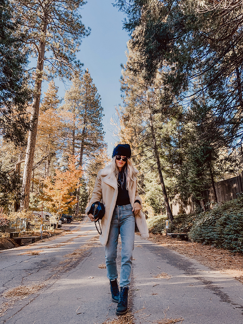 fall style, casual style with jeans, blonde on a tree lined street in the fall in lake arrowhead, love maegan