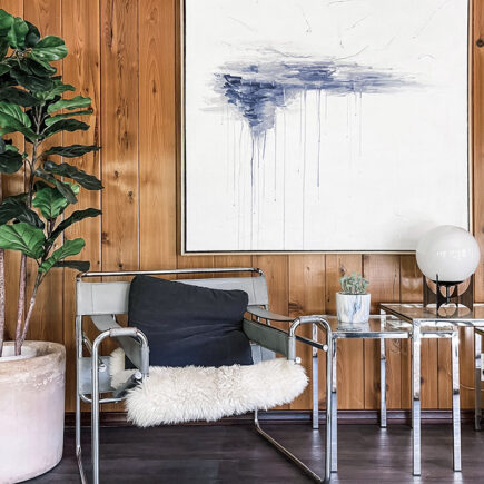 retro 60s 80s look-wood paneled walls-large white canvas minimal abstract art-wassily chair