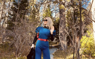 denim jumpsuit with flared legs-red bow belt and faux fur coat jacket -valentine's day, self love