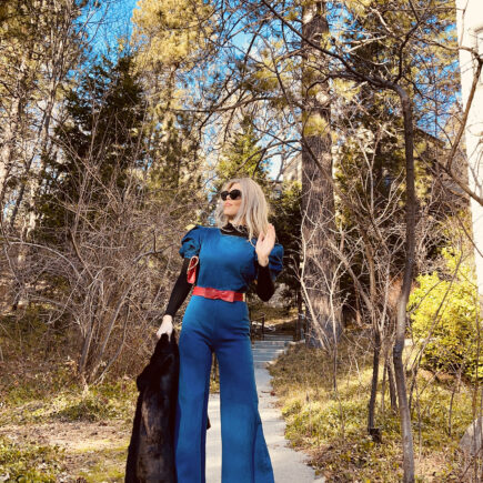 denim jumpsuit with flared legs-red bow belt and faux fur coat jacket -valentine's day, self love