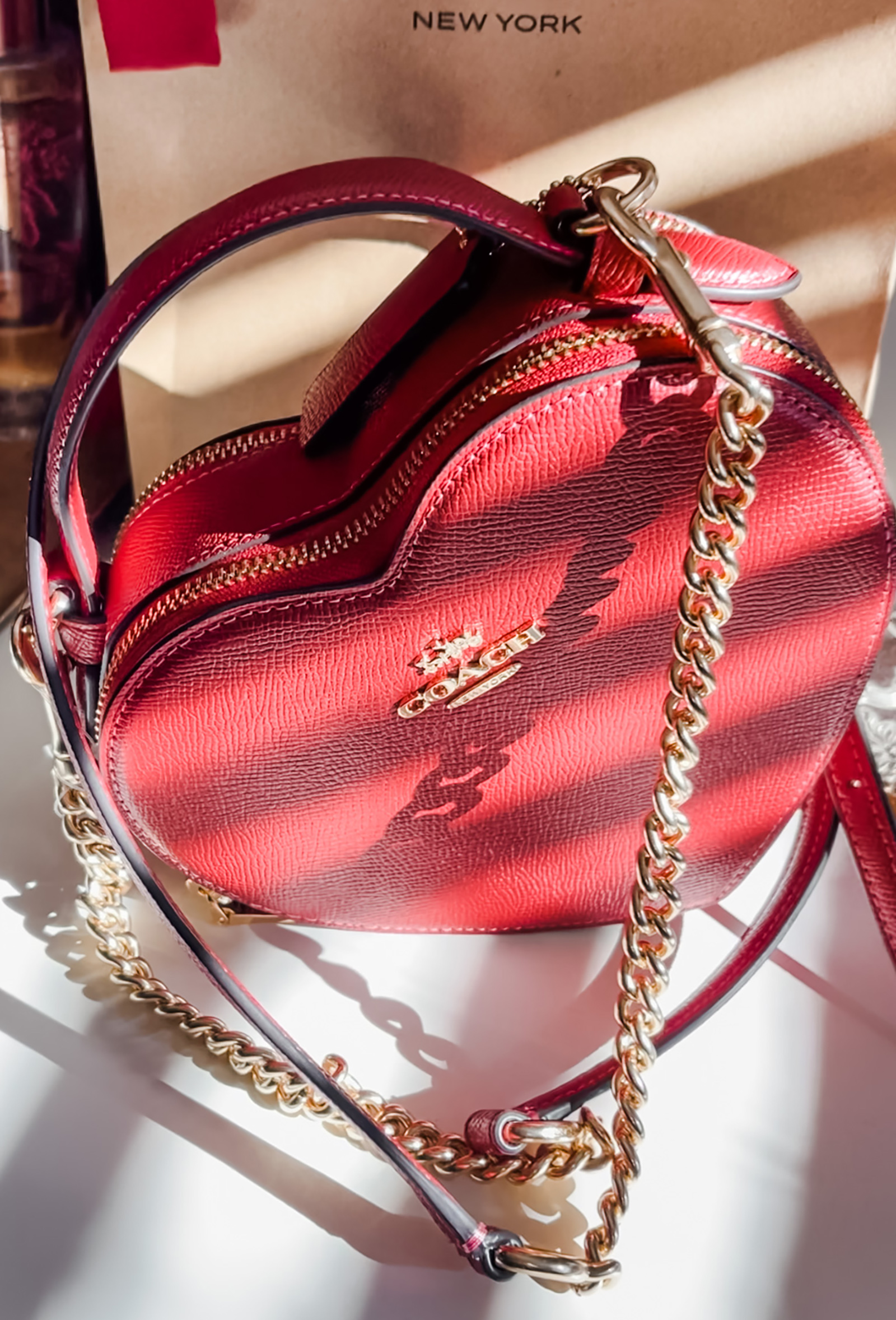 red heart shaped bag