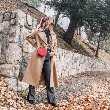 red heart coach bag-valentine's day look-vintage levis jeans with hem slit-brown coat