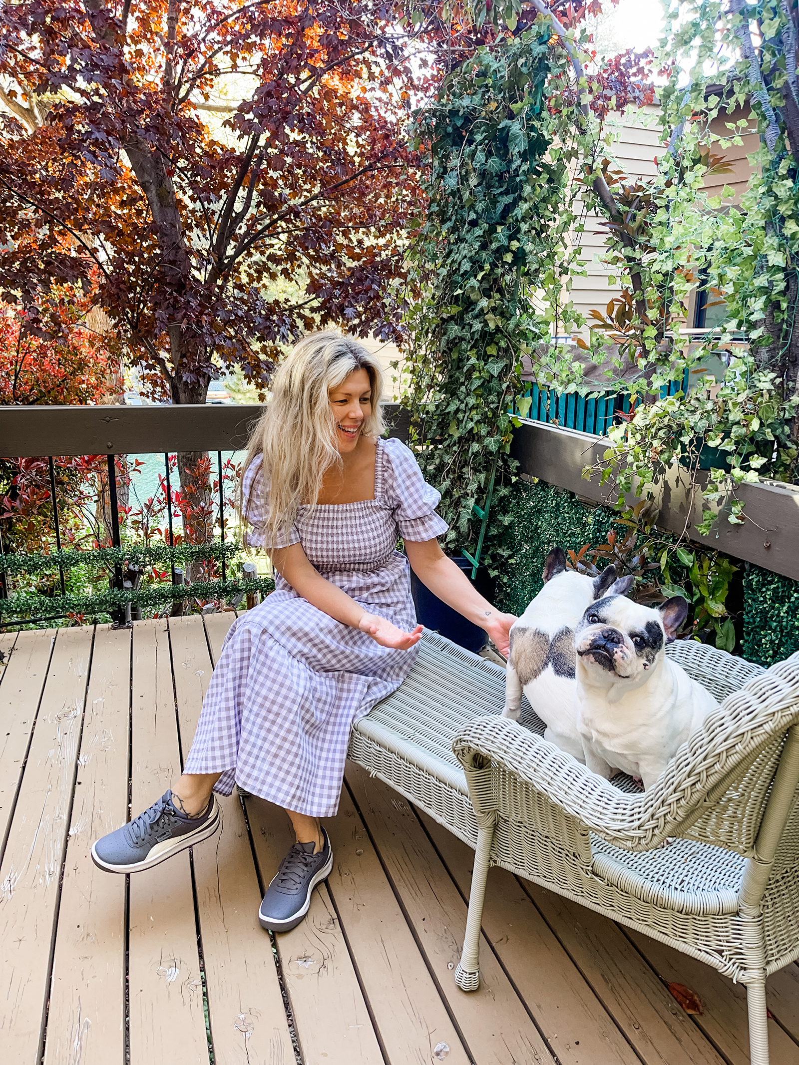 grey and white midi gingham dress with puff sleeves and tiers with vintage pink prada nylon bag and gray puma california casual sneakers in lake arrowhead