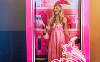 Barbie-movie-theater-barbie in the box-shes-having-the-best-day-pink-box-pink-dress-stereotypical-barbie-scaled