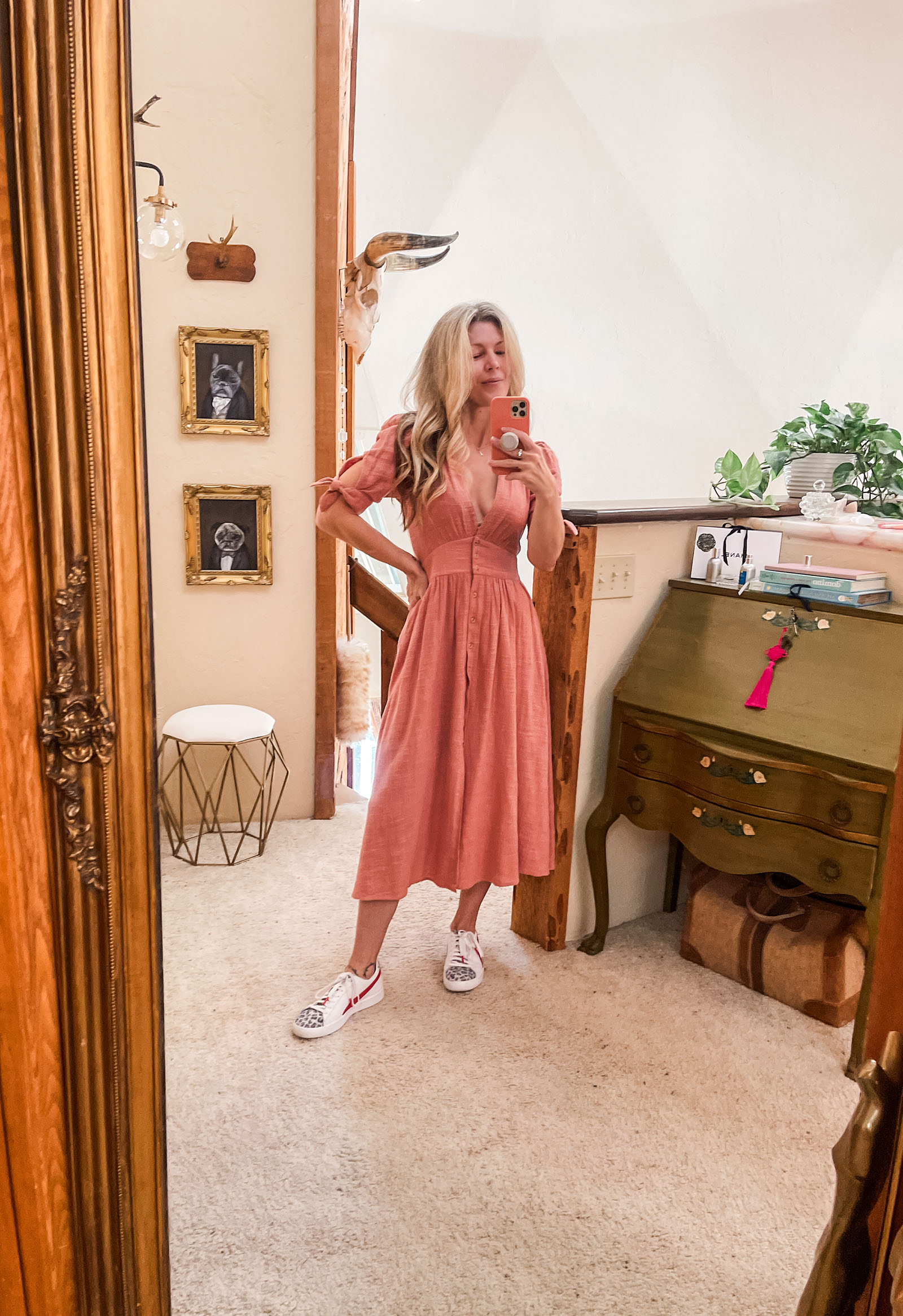 pink free people midi love of my life dress with white and red and leopard print puma sneakers tennis shoes and army green jacket