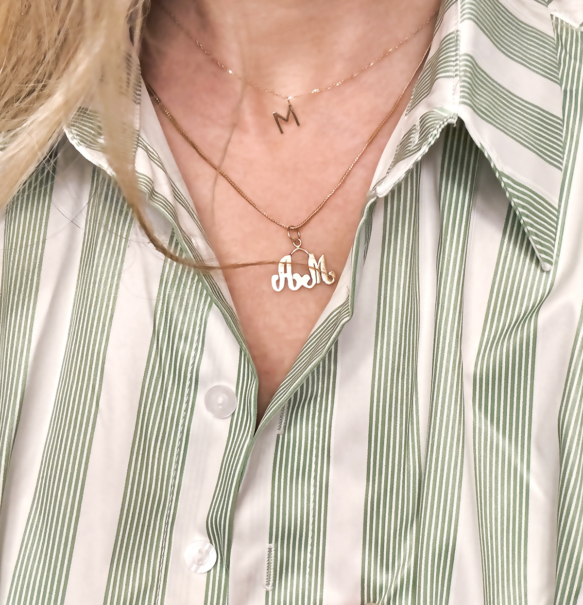 classic simple and ornate gold necklaces with initial chars