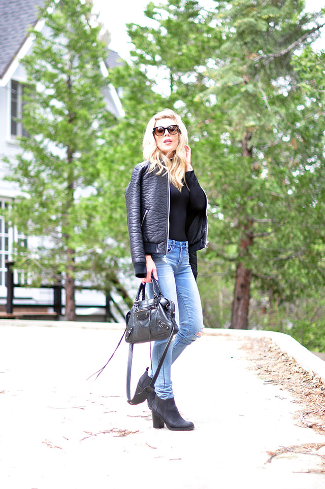 90s jeans and black bodysuit with bomber jacket