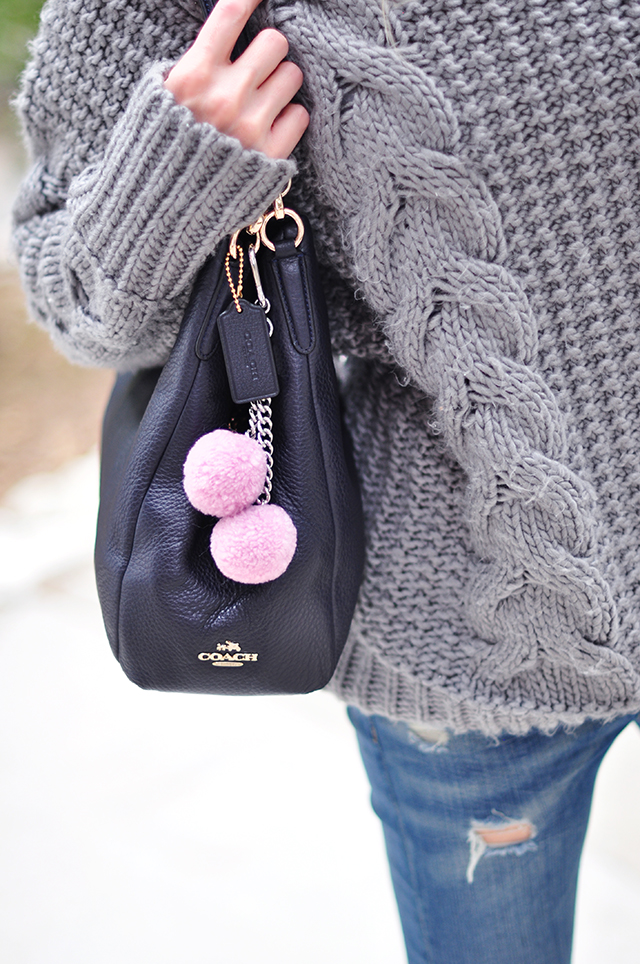 Coach bag_Pink poms_bag charms_gray sweater_jeans