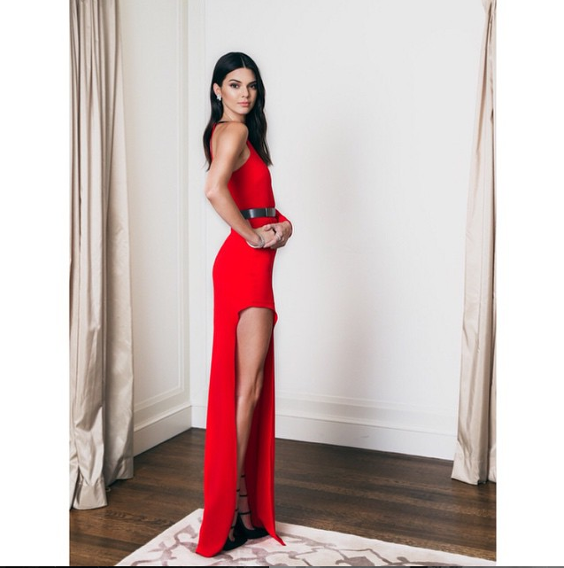 Kendall Jenner red dress with high leg slit