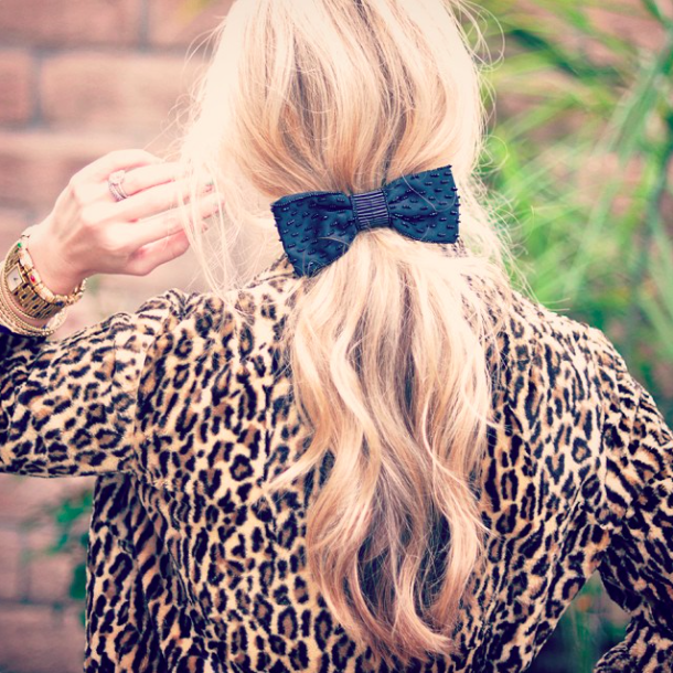 soft low pony with bow