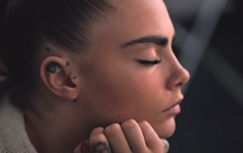 tiny tattoos around her ear