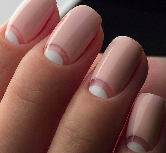 pink and white half moon nail art manicure