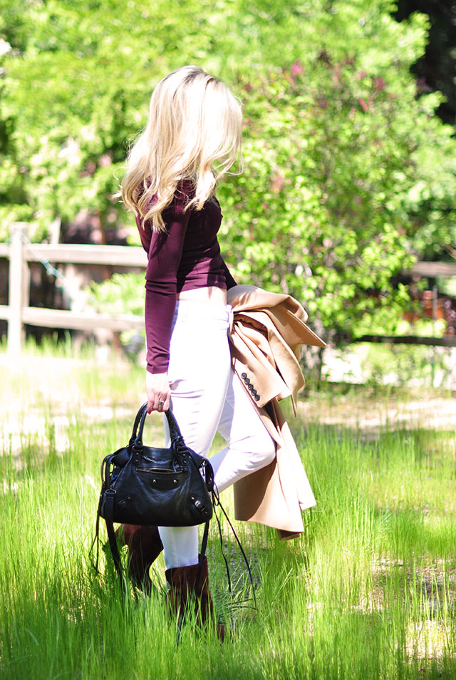 White jeans_balenciaga bag_camel coat_burgundy lace up top