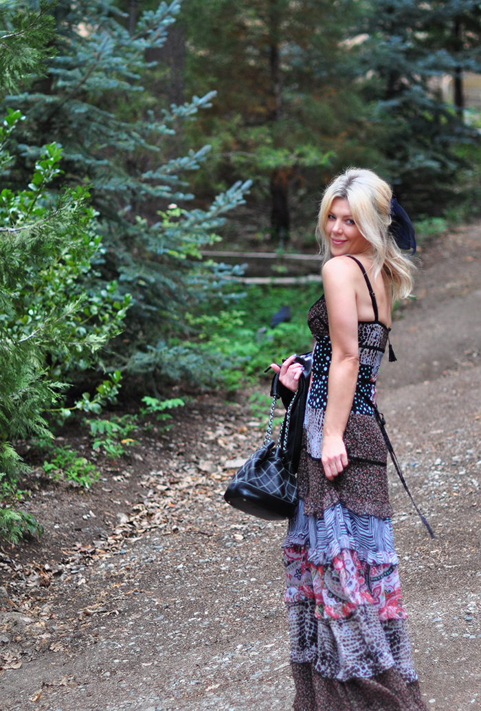 tiered max dress with floral embroidered leather jacket and chanel bag