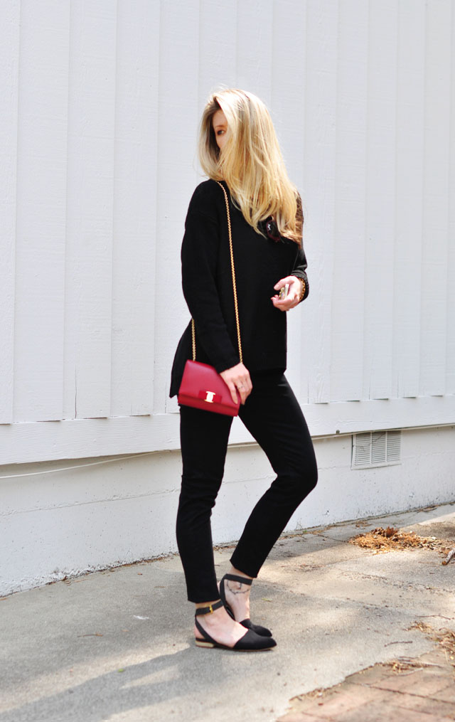 black jeans-black sweater-red bag