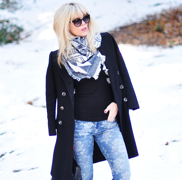 blue and black outfit in the snow