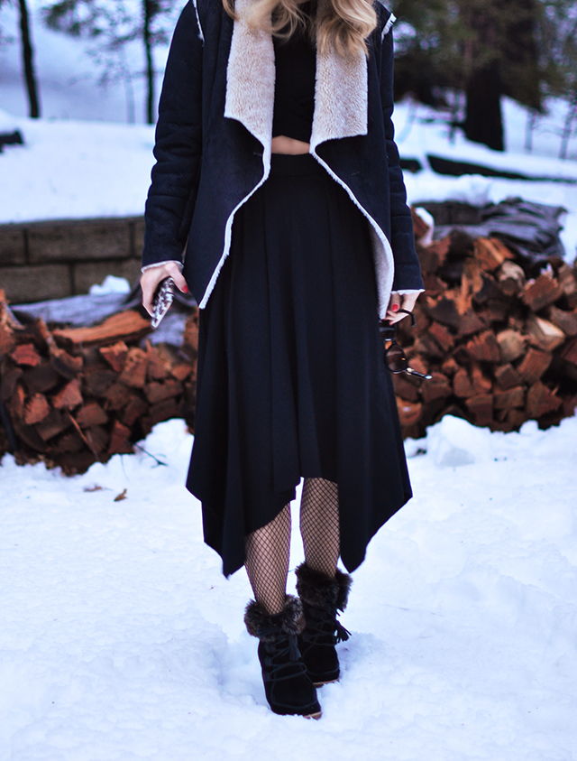 cut out dress with fishnets in the snow