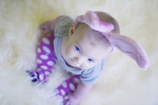 cute baby with bunny ears for easter