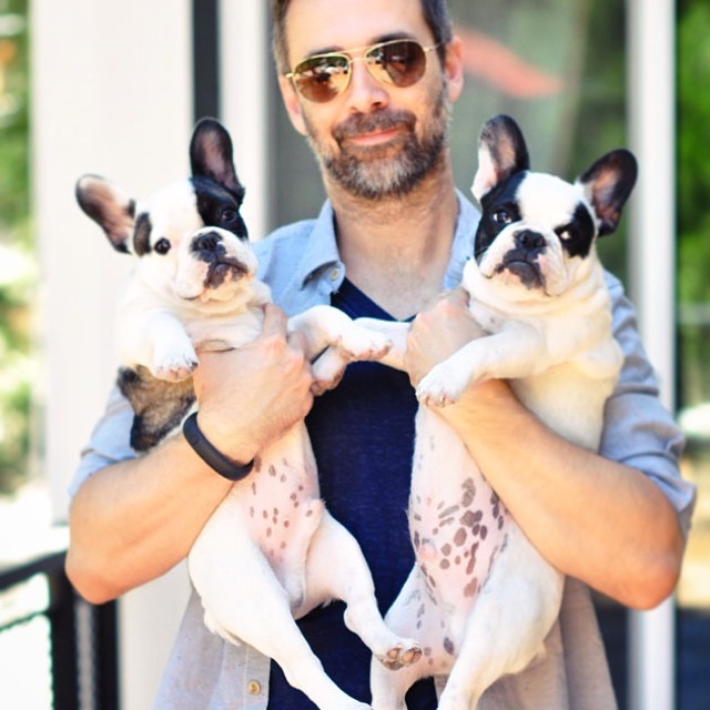 husband with puppies