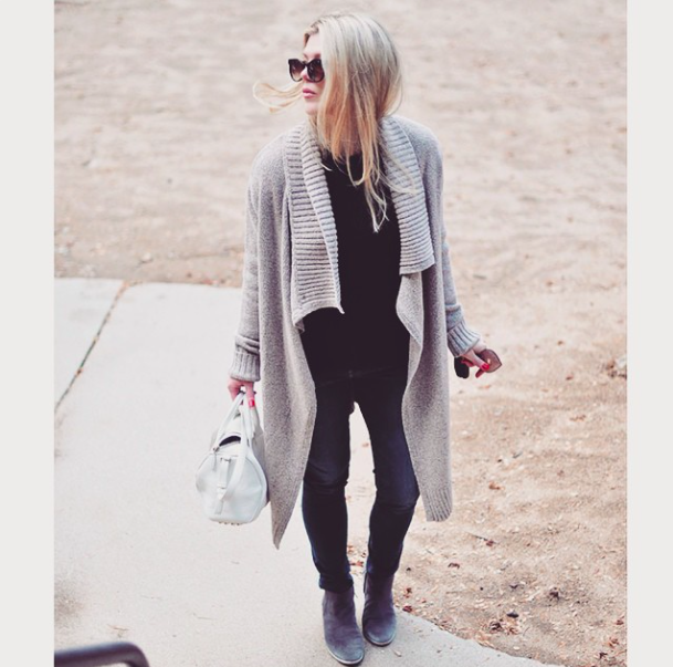 jeans and boots and oversized sweater