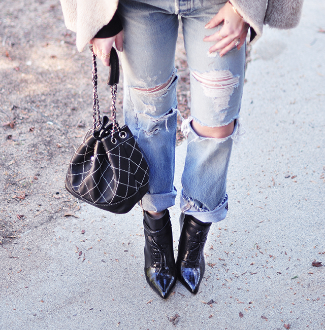 levis 501s_ripped jeans _chanel bucket bag_ankle boots