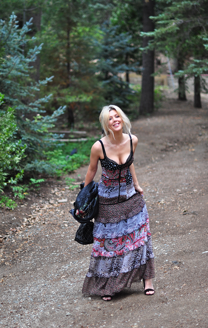 tiered max dress with floral embroidered leather jacket and chanel bag