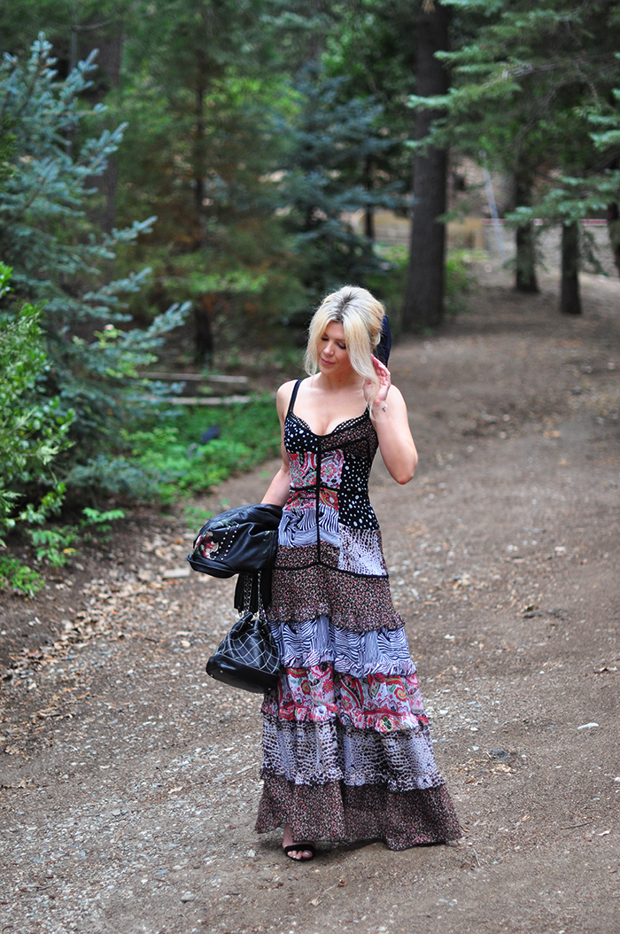 tiered max dress with floral embroidered leather jacket and chanel bag