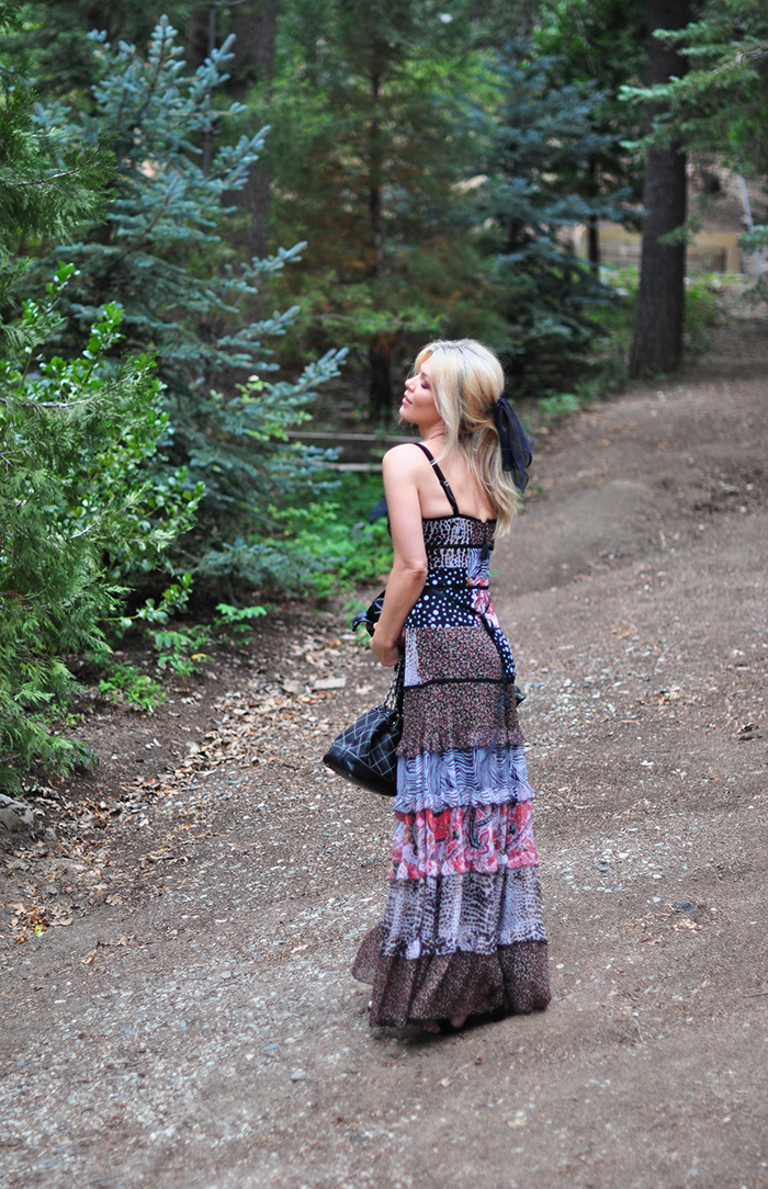 tiered max dress with floral embroidered leather jacket and chanel bag