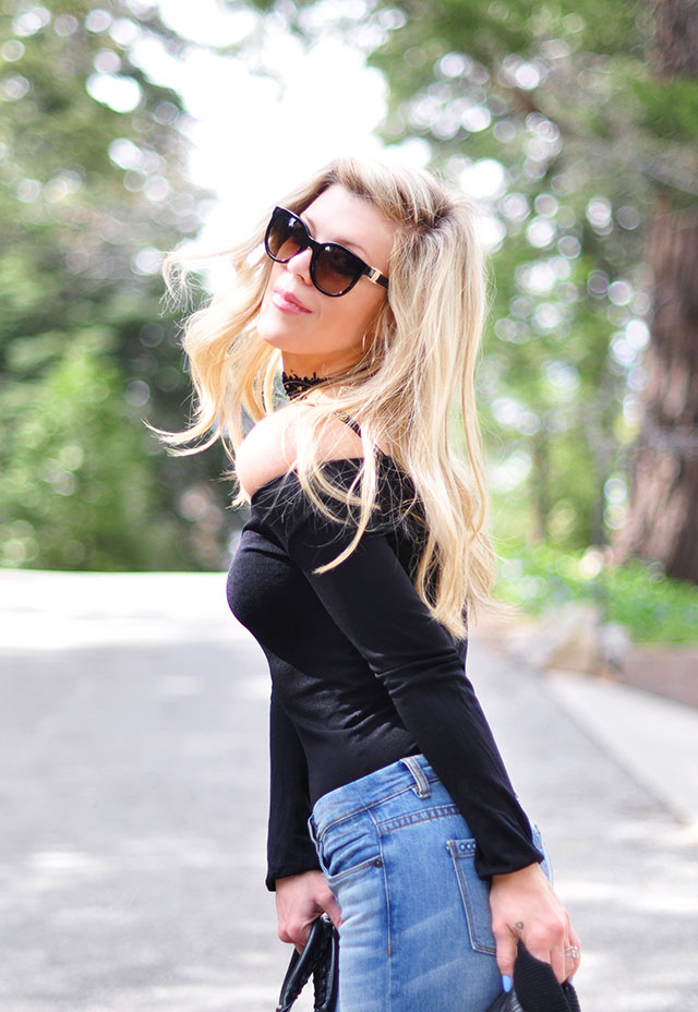 off the shoulder black bodysuit and jeans