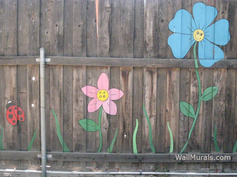 flower painted backyard fence