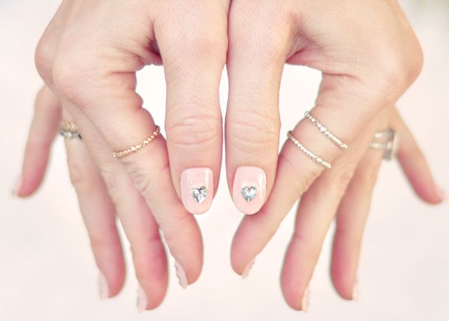 pink nails with crystal hearts