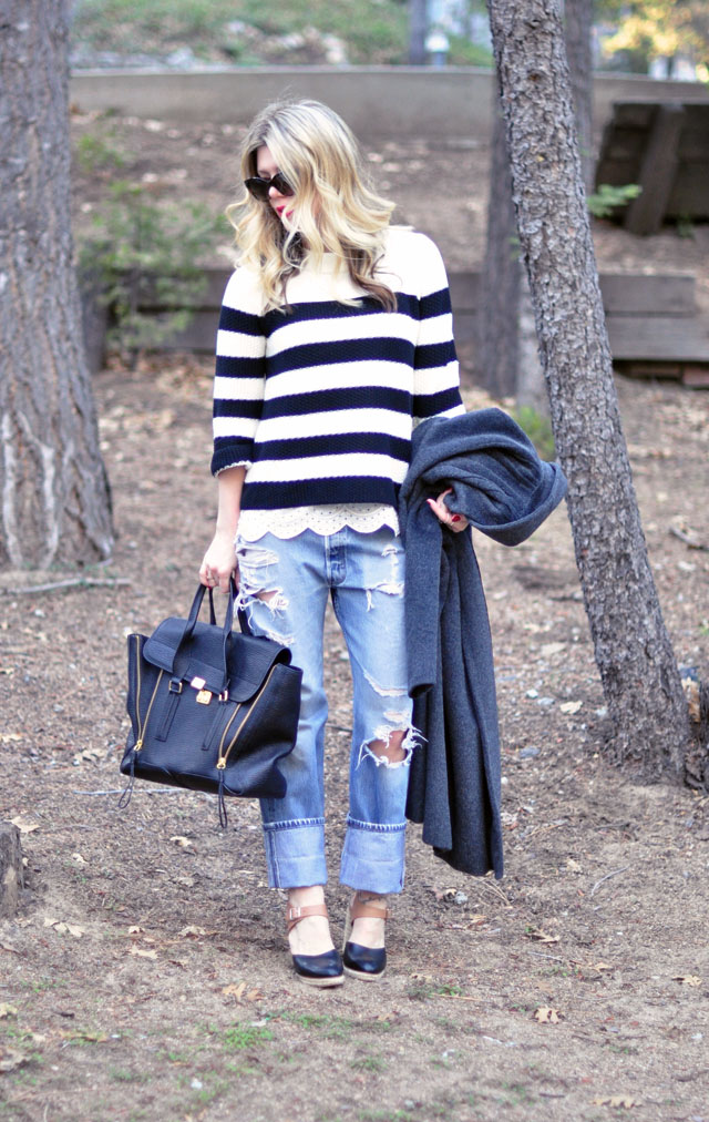 ripped Levis jeans-striped sweater- 31 phillip lim bag