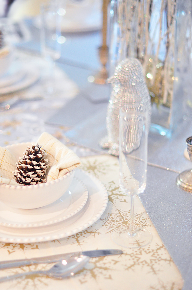 silver and gold holiday table_penguins and pinecones