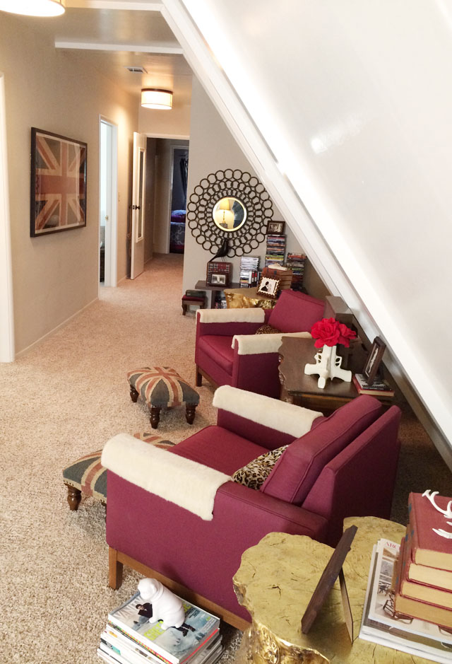 slanted ceiling long hallway sitting area