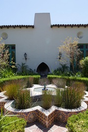 spanish style mission home and courtyard