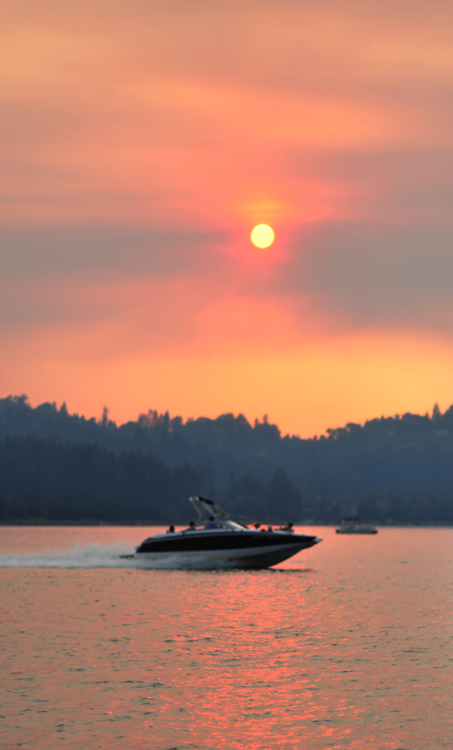 summer solstice sunset and boats on lake arrowhead