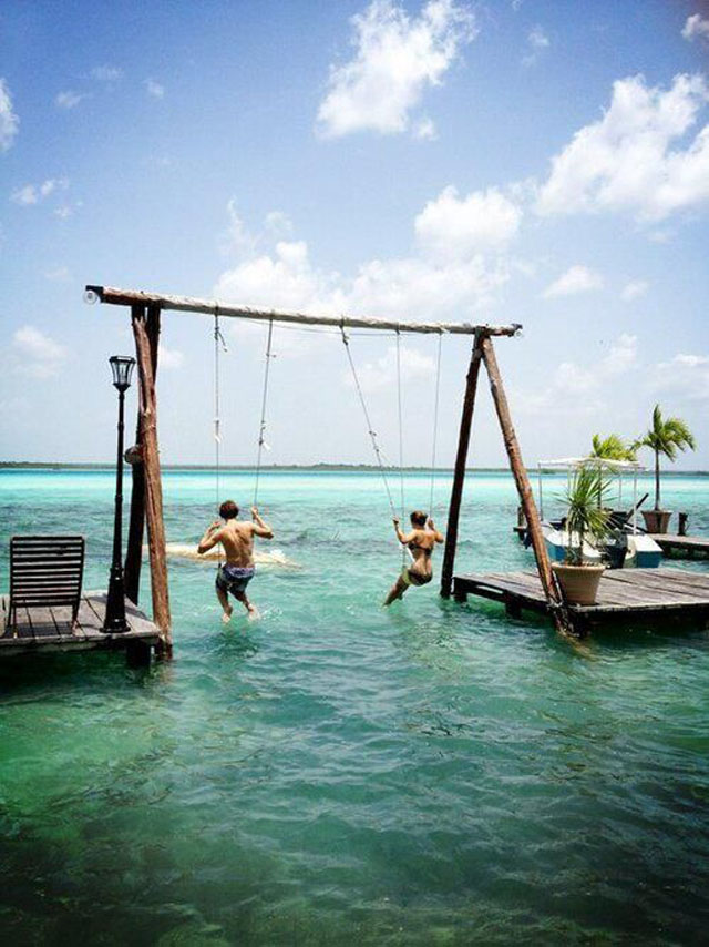 swingset over the water